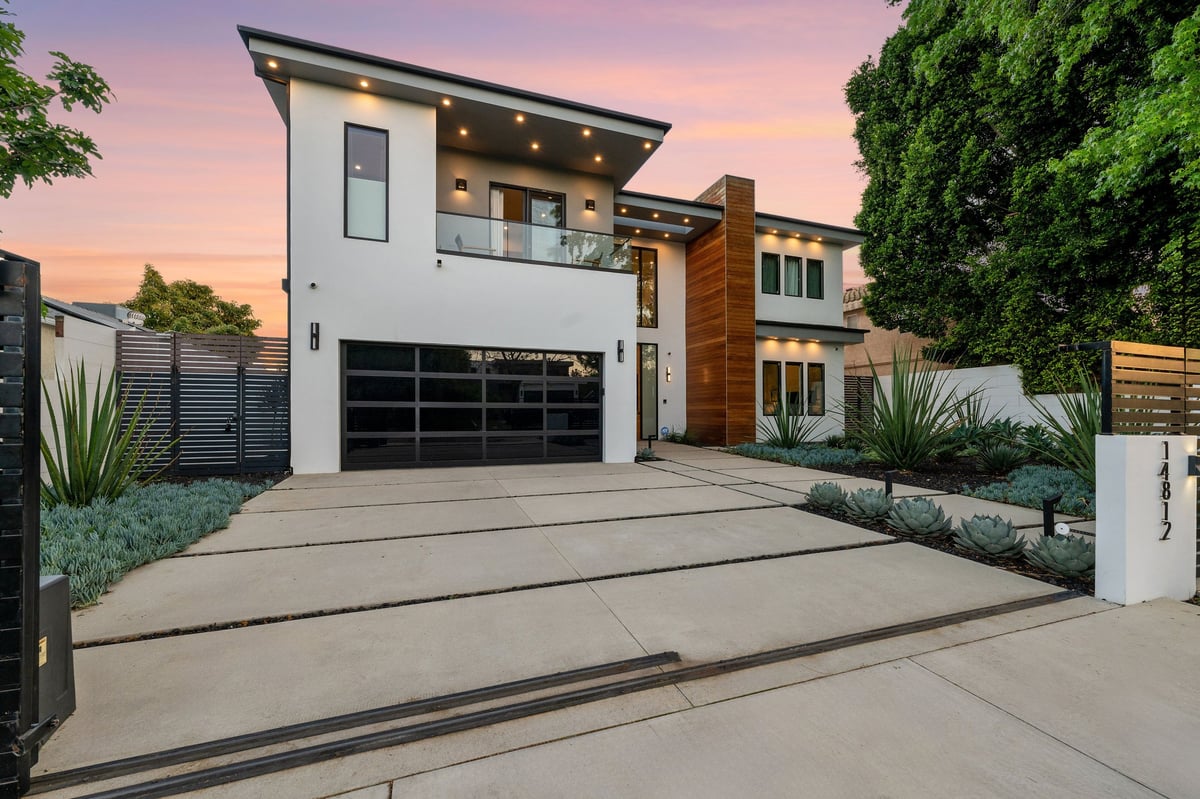 Luxury home at twilight — foreclosure defense protects every type of home